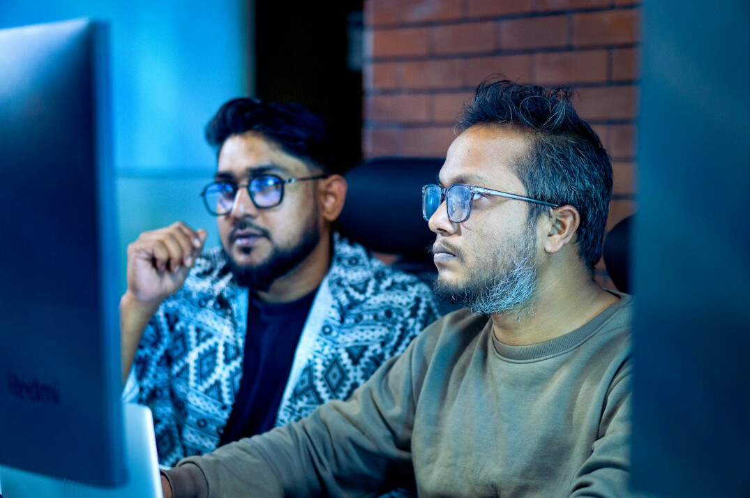 team of programmers collaborating